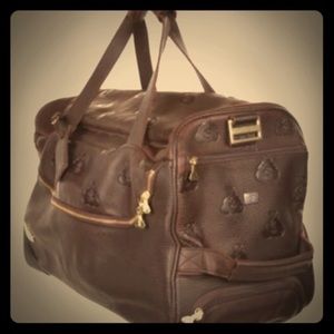 Gene Simmons luscious stamped leather travel bag